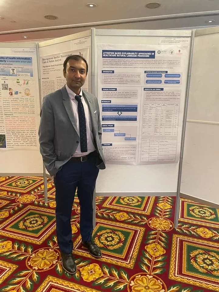 Dr. Bukhari and colleagues presenting biomedical informatics research